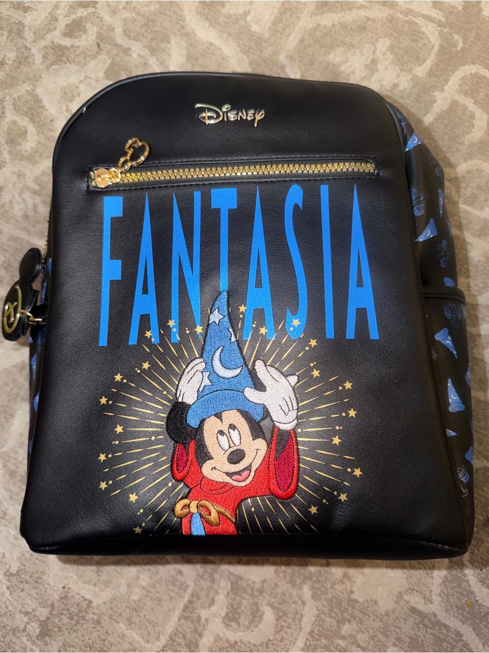 Disney Fantasia backpack features an embroidered Sorcerer Mickey Mouse design.
